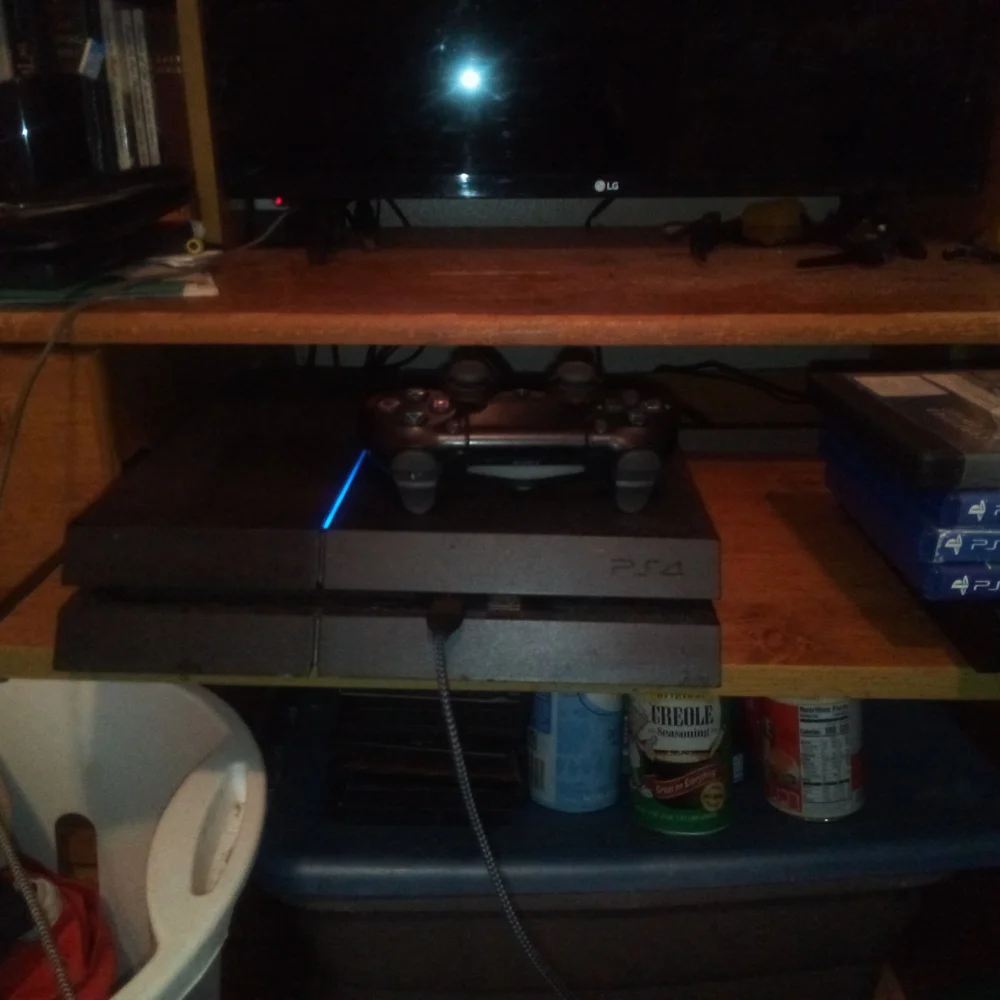 Sony PlayStation 4 Console - Black with Blue Light